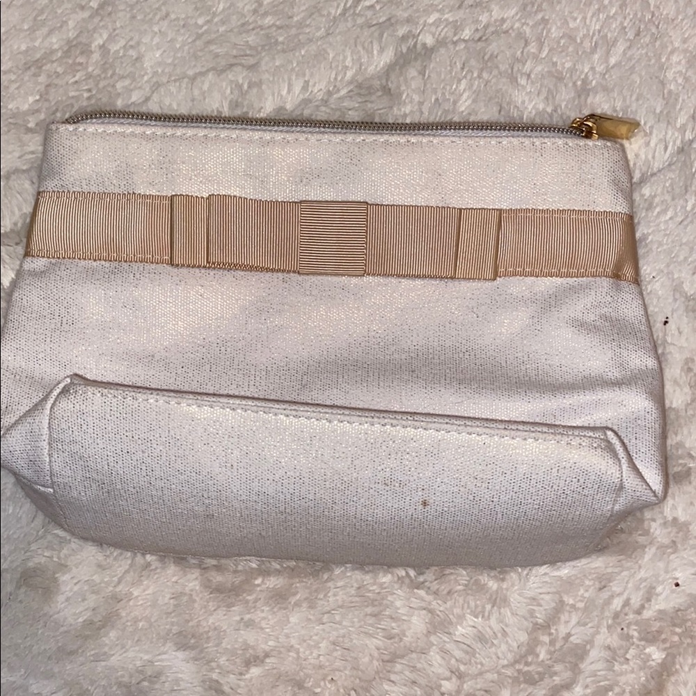 Elegant Cream Clutch with Gold Accents
